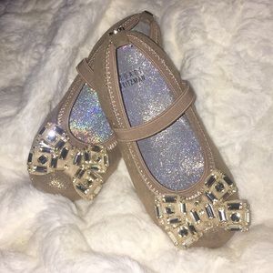 Stuart Weitzman gold shoe